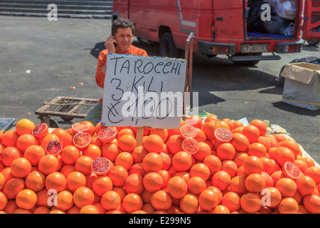 Orange seller in Catania street food market Stock Photo