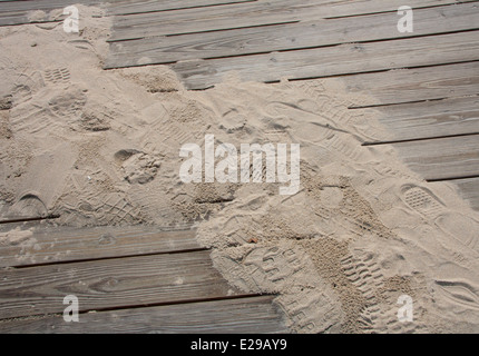 Ocean City, MD – May 1, 2014: Sand & the Boardwalk are two iconic elements of Ocean City. Stock Photo