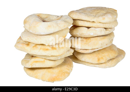 two piles containing thirteen stacked pita breads Stock Photo