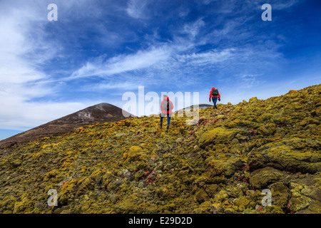 Hikers reaching summit of Mount Etna Stock Photo
