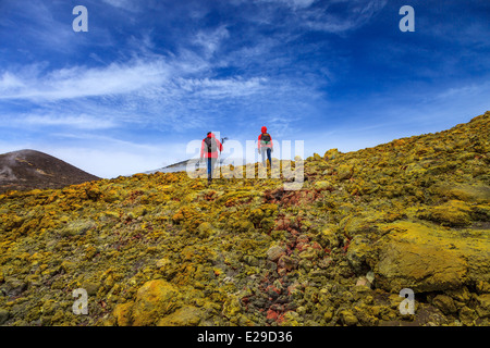 Hikers reaching summit of Mount Etna Stock Photo