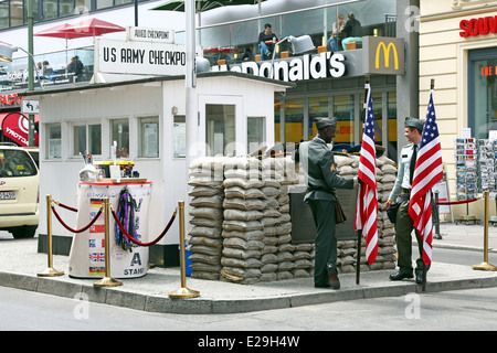 Checkpoint Charlie old East West border crossing post in Friedrichstrasse in Berlin, Germany Stock Photo