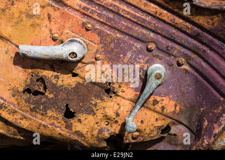 Rusty door and handles on an old abandoned car, Oregon. Stock Photo