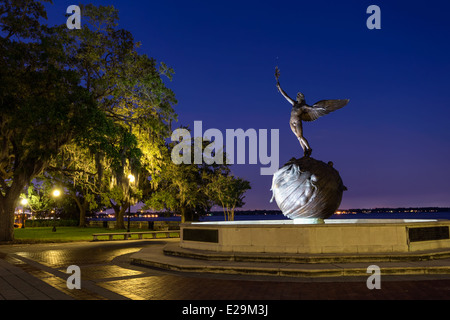 "Life" Bronze Statue by Charles Adrian Pillars, located in Memorial Park in Jacksonville, Florida. Photographed at Twilight. Stock Photo