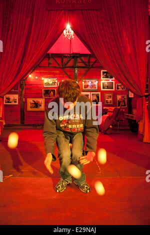 France, Paris, Cirque Tsigane Romanes (Romanes Tsigane Circus), juggler training before the performance Stock Photo