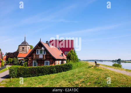 Houses on the dike, Wahrenberg, Saxony-Anhalt, Germany Stock Photo