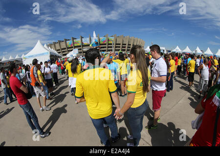Minas Gerais, Brazil. 17th June, 2014. Fans arrive at the Mineirao Stadium in Belo Horizonte, Minas Gerais, southeastern Brazil, hours before the match between Belgium and Algeria for the 2014 FIFA World Cup. Credit:  dpa picture alliance/Alamy Live News Stock Photo