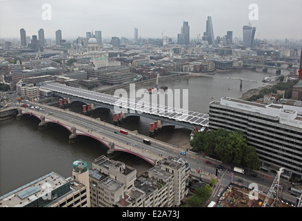 A view of the River Thames from high level showing Blackfriars Road and rail bridges with the City of London skyline Stock Photo