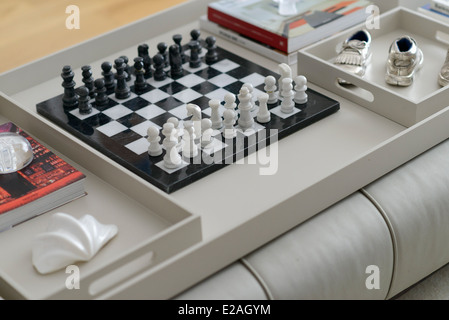 Chess board on a coffee table Stock Photo