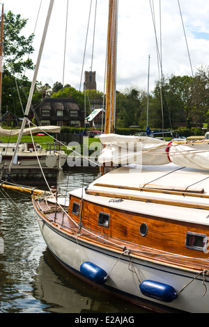 Yachts moored at Village of Ranworth. Malthouse Broad. Norfolk Broads England Britain Stock Photo