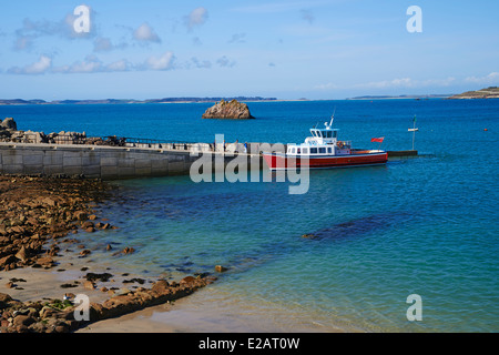 passengers getting ready to board Seahorse boat at St Agnes, Isles of Scilly, Scillies, Cornwall in April Stock Photo