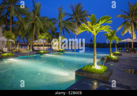 Swimming pool at Hoi An Beach Resort, Cua Dai beach, Hoi An, Quang Ham, Vietnam Stock Photo