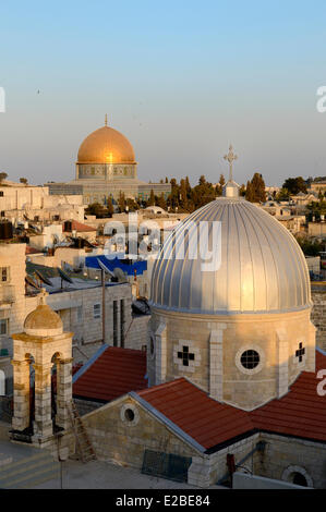 Israel, Jerusalem, holy city, the old town listed as World Heritage by UNESCO, the roofs of the Muslim Quarter, the church of Our Lady of the Spasm and the Dome of the Rock in the background Stock Photo