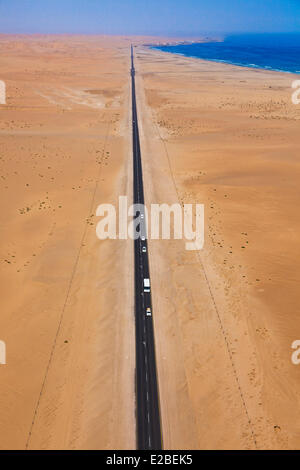 Namibia, Erongo Region, between Sawkopmund and Walvis Bay, beach, sand dunes, road (aerial view) Stock Photo