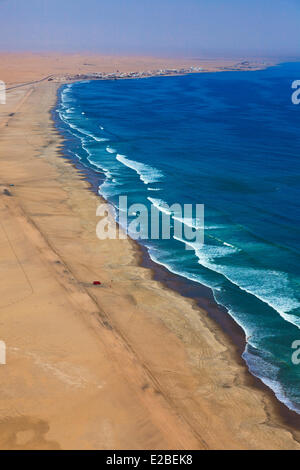 Namibia, Erongo Region, between Sawkopmund and Walvis Bay, beach, sand dunes, road (aerial view) Stock Photo