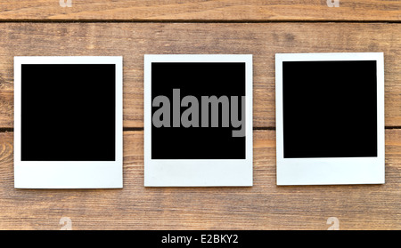 photo frames on wood background Stock Photo