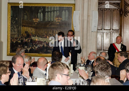 London, UK, 18th June, 2014. George Osborne Chancellor of the Exchequer given round of applause after speech at the Margaret Thatcher Conference on Liberty 18th June 2014 Guildhall London uk Maurice Saatchi behind. Charles Moore btm left John Howard former Australian PM top right Credit:  Prixnews/Alamy Live News Stock Photo