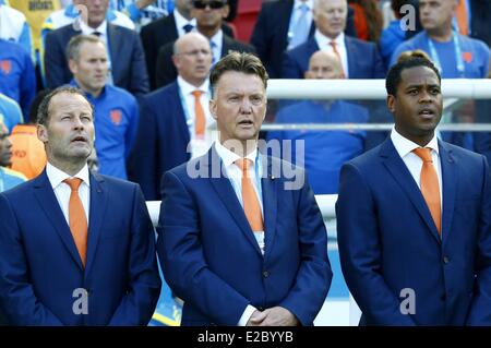 Porto Alegre, Brazil. 18th June, 2014. Netherlands coach Louis Van Gaal (C) sings Netherlands national anthem before a Group B match between Australia and Netherlands of 2014 FIFA World Cup at the Estadio Beira-Rio Stadium in Porto Alegre, Brazil, June 18, 2014. Credit:  Action Plus Sports Images/Alamy Live News Stock Photo