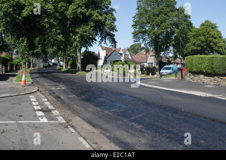 Road resurfacing work in suburban Sheffield Stock Photo