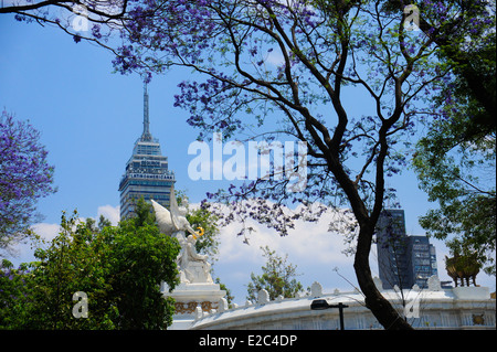 Benito Juarez Monument in Alameda Park, Mexico City, Mexico. Torre Latino Americana in background. Stock Photo