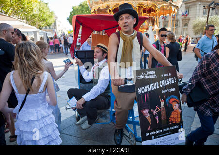 France, Vaucluse, Avignon, Avignon Festival 2012, the actors are promoting their show Stock Photo