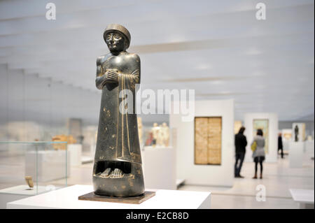 France, Pas de Calais, Lens, Lens Louvre Museum designed by SANAA Japanese Architecure Firm and architects Celia Imrey and Tim Culbert, Galerie du Temps (Gallery of the Time), Antiquity, Mesopotamia, diorite statue of Gudea, Prince of Lagash state, 2120 BC Stock Photo