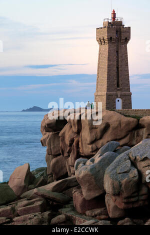 France, Cotes d'Armor, Cote de Granit Rose (Pink Granite Coast), Ploumanac'h, Pointe de Squewel and the Mean Ruz lighthouse Stock Photo