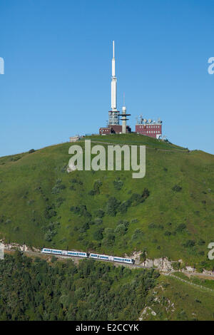 France, Puy de Dome, Parc Naturel Regional des Volcans d'Auvergne (Natural regional park of Volcan d'Auvergne), Chaine des Puys, Orcines, the Puy de Dome, the cog railway Panoramique des Domes (aerial view) Stock Photo