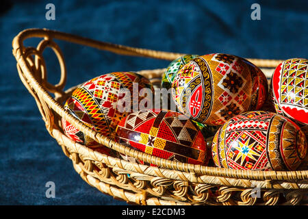Romania, Bukovina Region, Moldovita, painted Easter eggs in a wicker basket Stock Photo