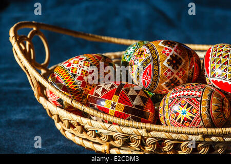 Romania, Bukovina Region, Moldovita, painted Easter eggs in a wicker basket Stock Photo