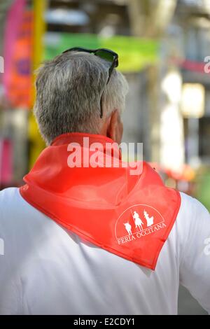 France, Herault, Beziers, annual feria in the streets of the city, man of back wearing a red scarf around the neck Stock Photo