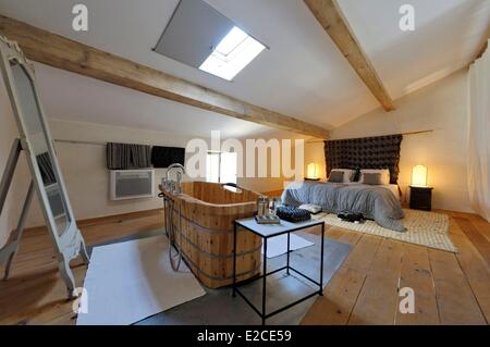 France, Herault, Lieurant les Beziers, Domain of Ribaute, room under attic of a house of full foot with a wooden bathtub inside Stock Photo