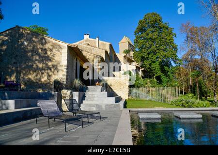 France, Herault, Lieurant les Beziers, Ribaute Castle, swimming pool with overflowing dressed in black molten glass and basalt Stock Photo