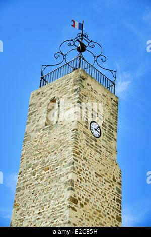 France, Herault, Lieurant les Beziers, omanic church Saint Martin of the 11th century, detail of the bell tower of a stone square tower surmounted by a guard body in ironworks Stock Photo