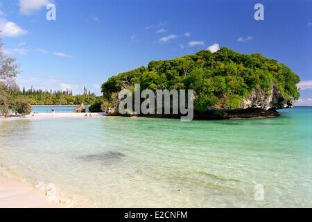 France New Caledonia Isle of Pines Kuto Bay Kanumera rock covered with vegetation Stock Photo