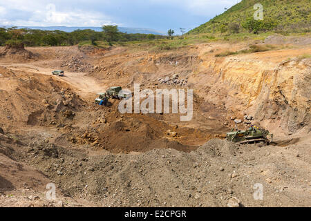 Kenya Nakuru national park works to rebuild the tracks of the park after the indontion of the lake Stock Photo