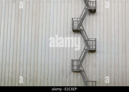 Fire escape ladder on modern industrial building Stock Photo