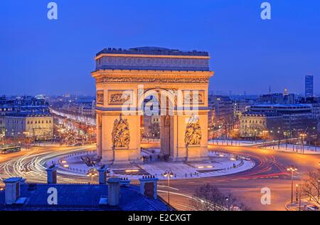 France Paris the Arc de Triomphe and the Charles de Gaulle Place illuminated at night the Champs Elysees avenue in the Stock Photo