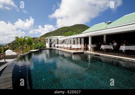 France Guadeloupe (French West Indies) Saint Barthelemy Toiny Le Toiny hotel terrace restaurant overlooking the pool Stock Photo