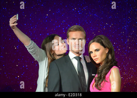 London, UK. 19th June, 2014. Madame Tussauds London reveals new wax figures of Victoria and David Beckham in London. Credit:  See Li/Alamy Live News Stock Photo