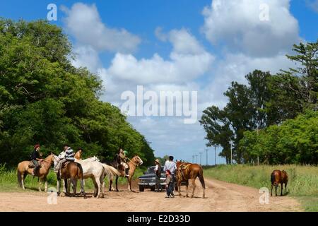 Argentina Buenos Aires Province gauchos on horseback on a trail near San Antonio de Areco Stock Photo