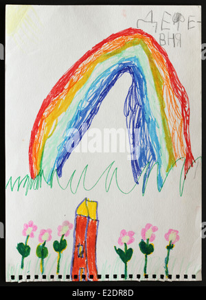 Original child's drawing of a rainbow over an orange house on the blossoming meadow drawn by a five-year-old girl. Inscription in Russian: The Village. Stock Photo