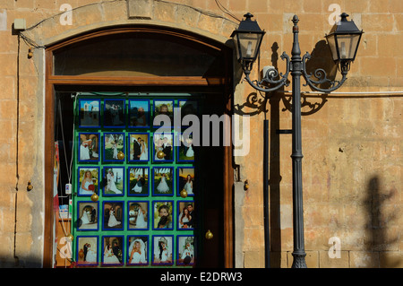 Wedding photographers front window shop display of married couple. Cyprus Stock Photo