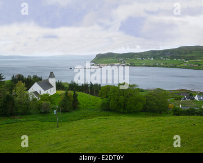 Looking across to Uig Ferry Port on Trotternish Peninsula Isle of Skye  Free Church of Scotland in front Stock Photo
