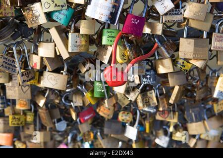 France Paris Pont des Arts (Arts' bridge) padlocks hung by lovers on the railing Stock Photo