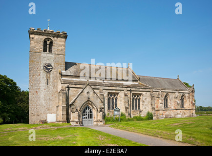 All Saints Church exterior in summer Rudston village East Yorkshire England UK United Kingdom GB Great Britain Stock Photo