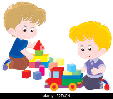 Little boys playing with a toy truck and bricks Stock Photo