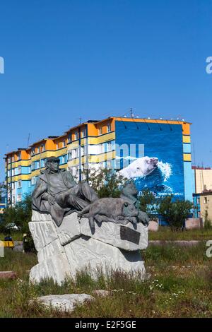 Russia Chukotka autonomous district Anadyr buildings painted or decorated with color pictures polar bear bronze statue Stock Photo