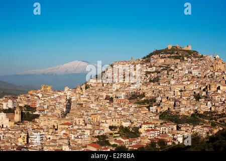 Italy, Sicily, Enna Province, Agira with the Mount Etna listed as World Heritage by UNESCO on the background Stock Photo