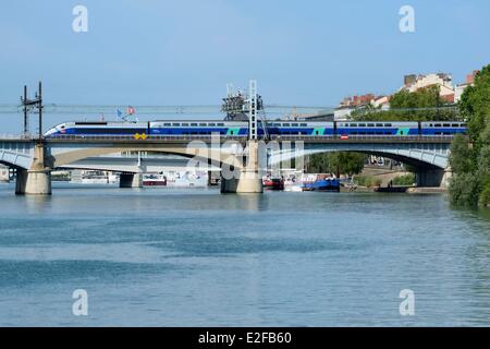 France, Rhone, Lyon, high speed train (TGV) crossing the Rhone near the Perrache station Stock Photo